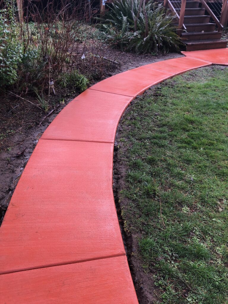 Red curved concrete walkway