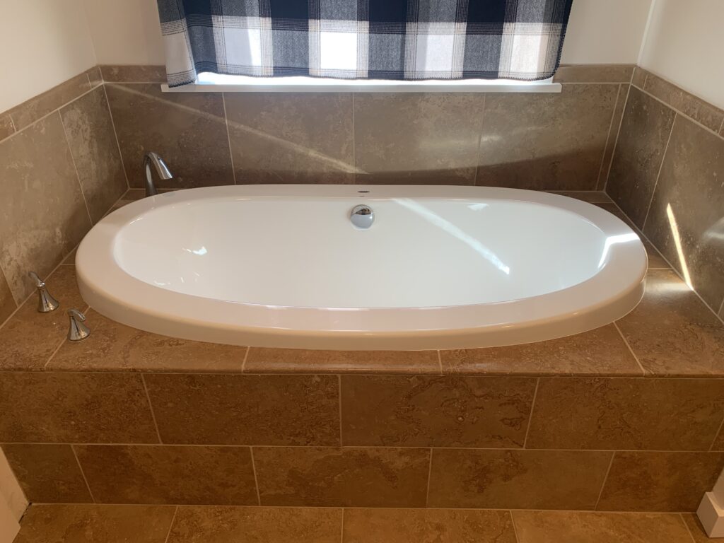 Tile and finishing for a bathroom sink and backsplash