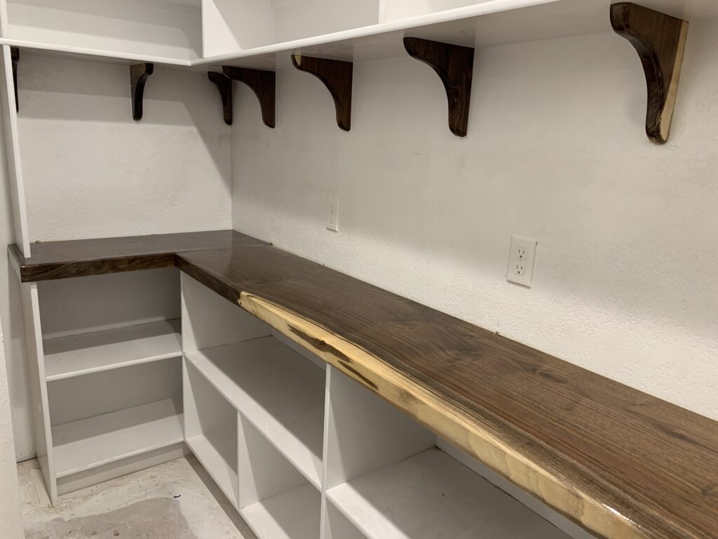 Wood finish on L-shaped closet counter space